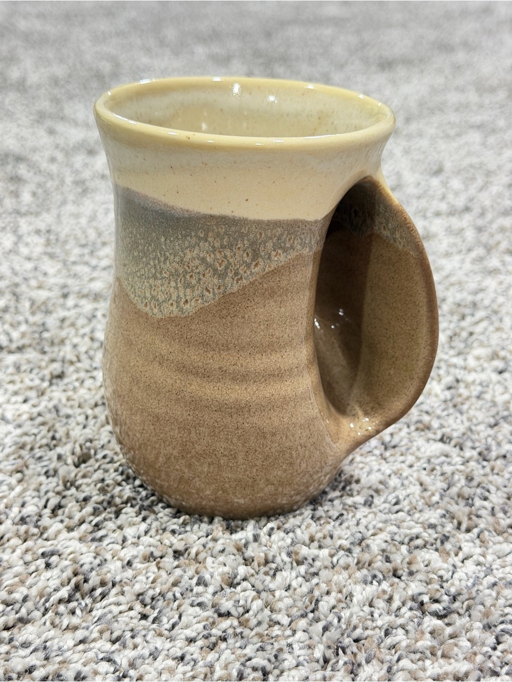 Handmade Neher hand warming Ceramic Coffee Mug in Cream and Brown.  Right handed